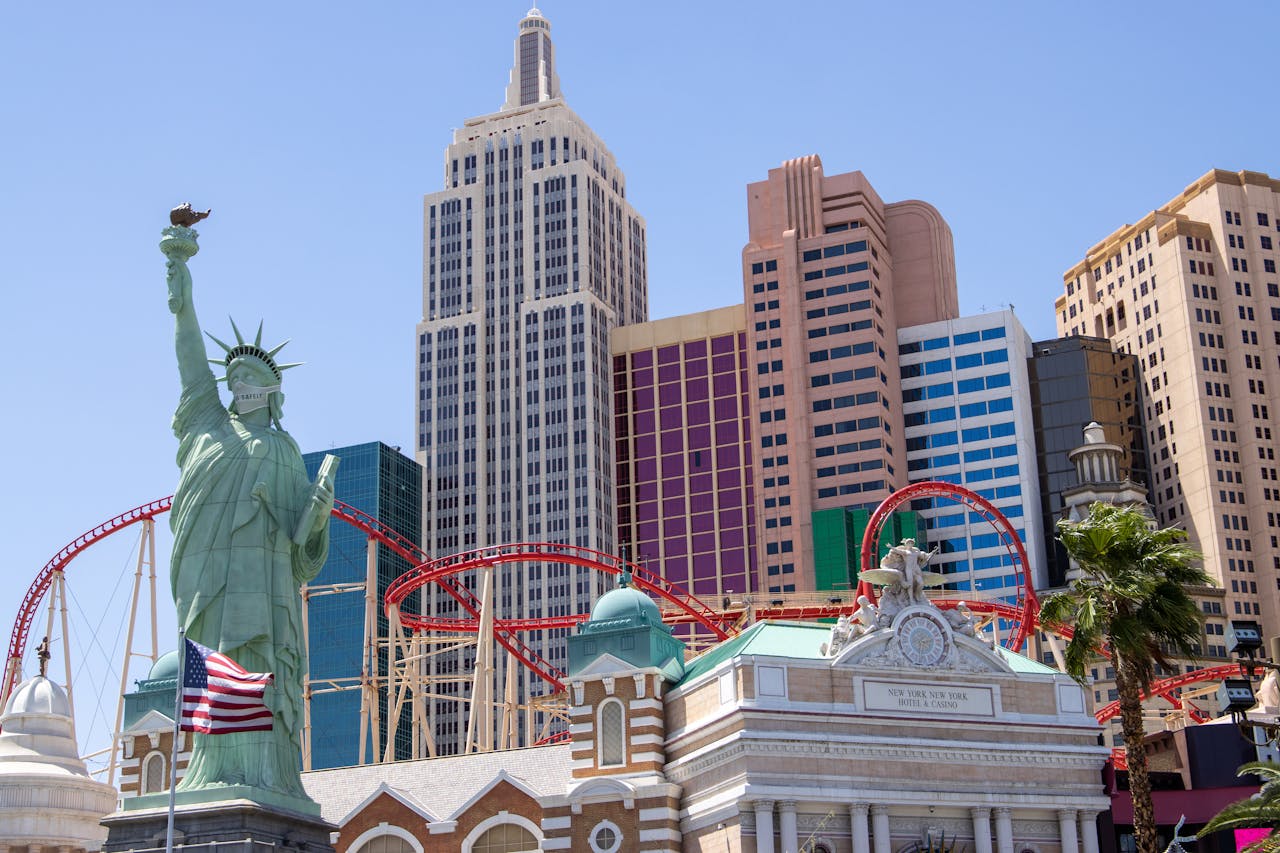 Iconic Las Vegas skyline featuring New York-New York Hotel with replica Statue of Liberty.